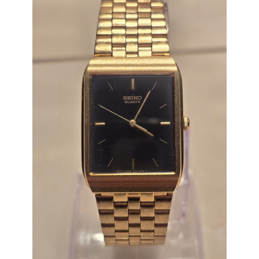 Seiko Tank Watch Men's 25mm Black Dial Gold Tone Date V701-5K39. New Battery
